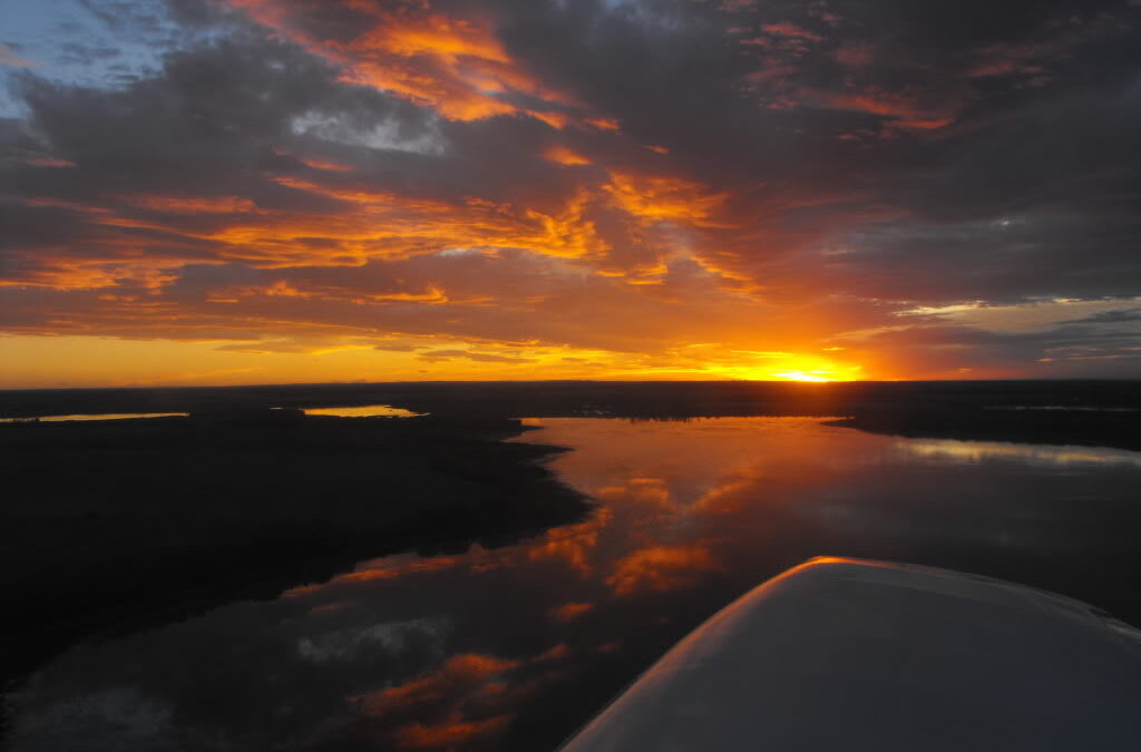 Sunset Reflection Off the Wing